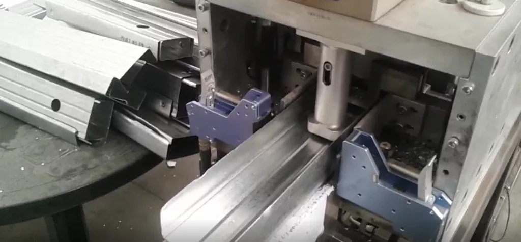 Continuous flattening of C-section profile during roll forming