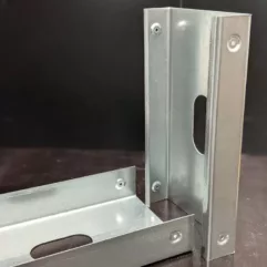 DIMPLED CORNER JOINT WITH SERVICE HOLES DIMPLED CORNER JOINT WITH SERVICE HOLES