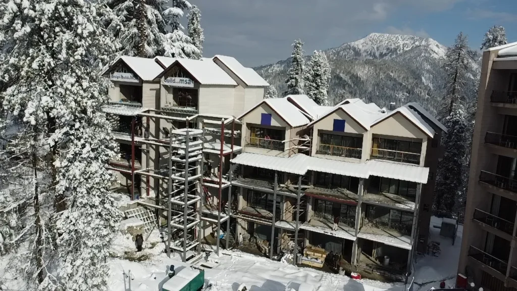 Chalets at Double Tree by Hilton MSA 3 - Scottsdale Construction Systems Roll forming Steel framing Light-gauge steel Mid-rise Wind design Snow design Seismic design Commercial light-gauge steel project Mid-rise steel-framed building Chalets at Double Tree by Hilton