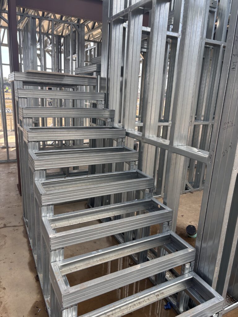Roll forming machines 11 - Scottsdale Construction Systems Premium homes Premium steel framed homes Steel framing Roll forming machines Custom steel framed homes