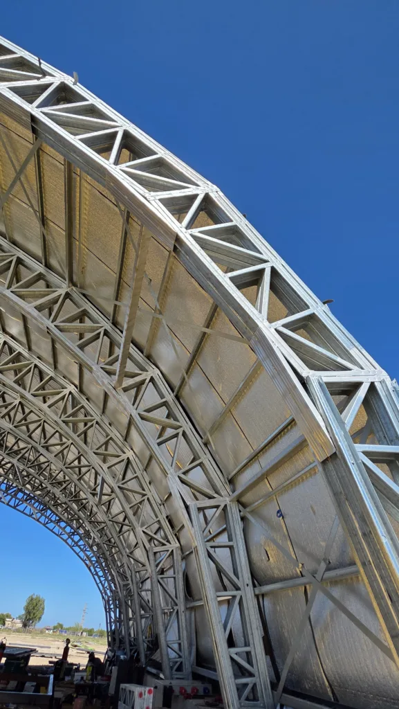 x2 - Scottsdale Construction Systems Curvilinear modular cold-formed steel commercial structure produced using Scotpanel 7090G1 advanced roll forming platform, developed and produced using Scotpanel 7090G1.